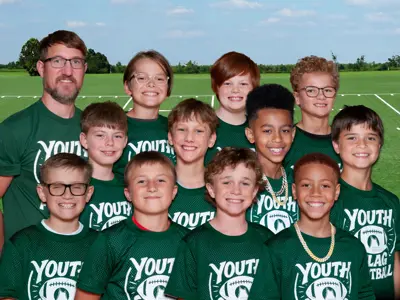 Youth baseball team, ten kids in red shirts