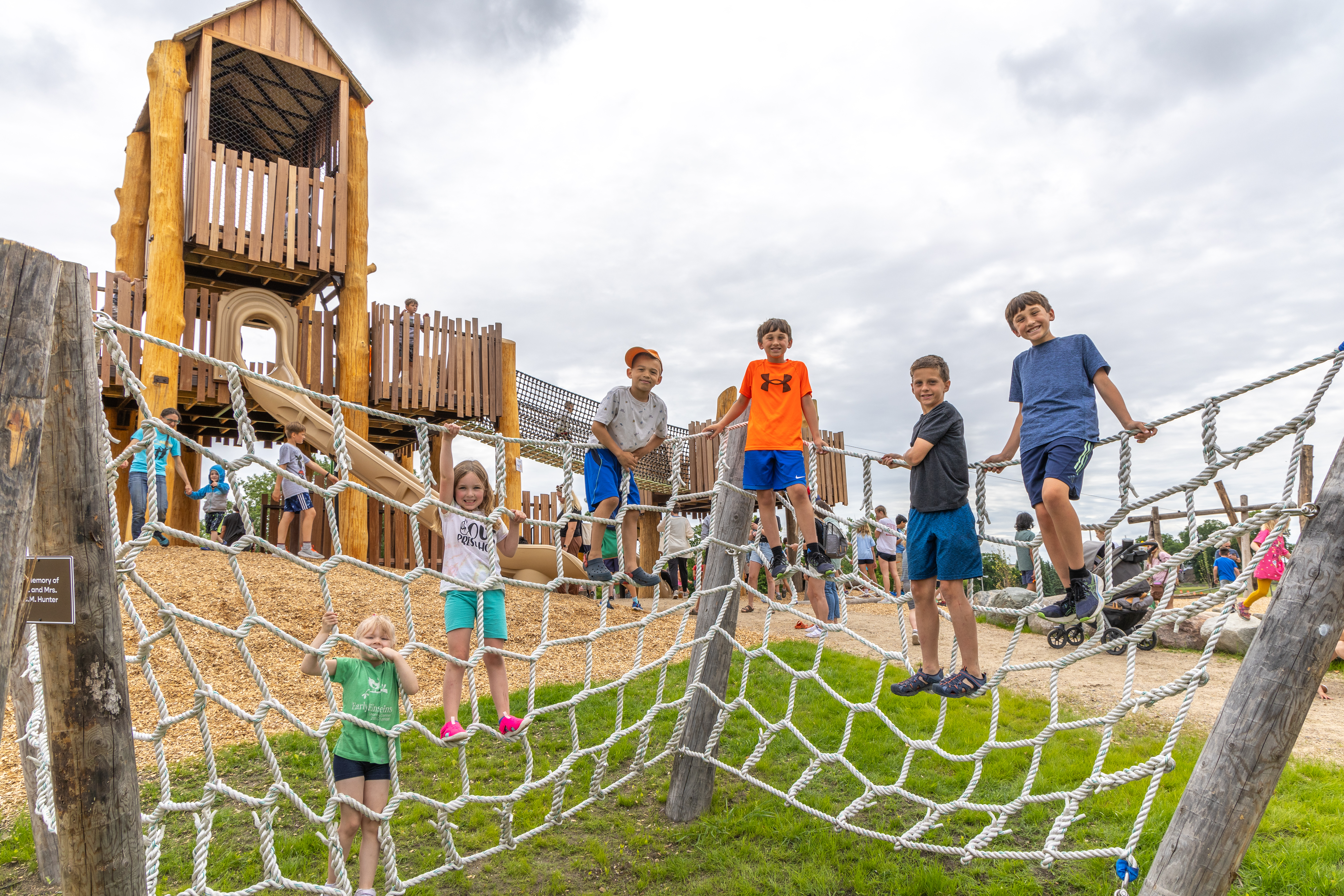 Kids playing at the Rotary Natural Play Area