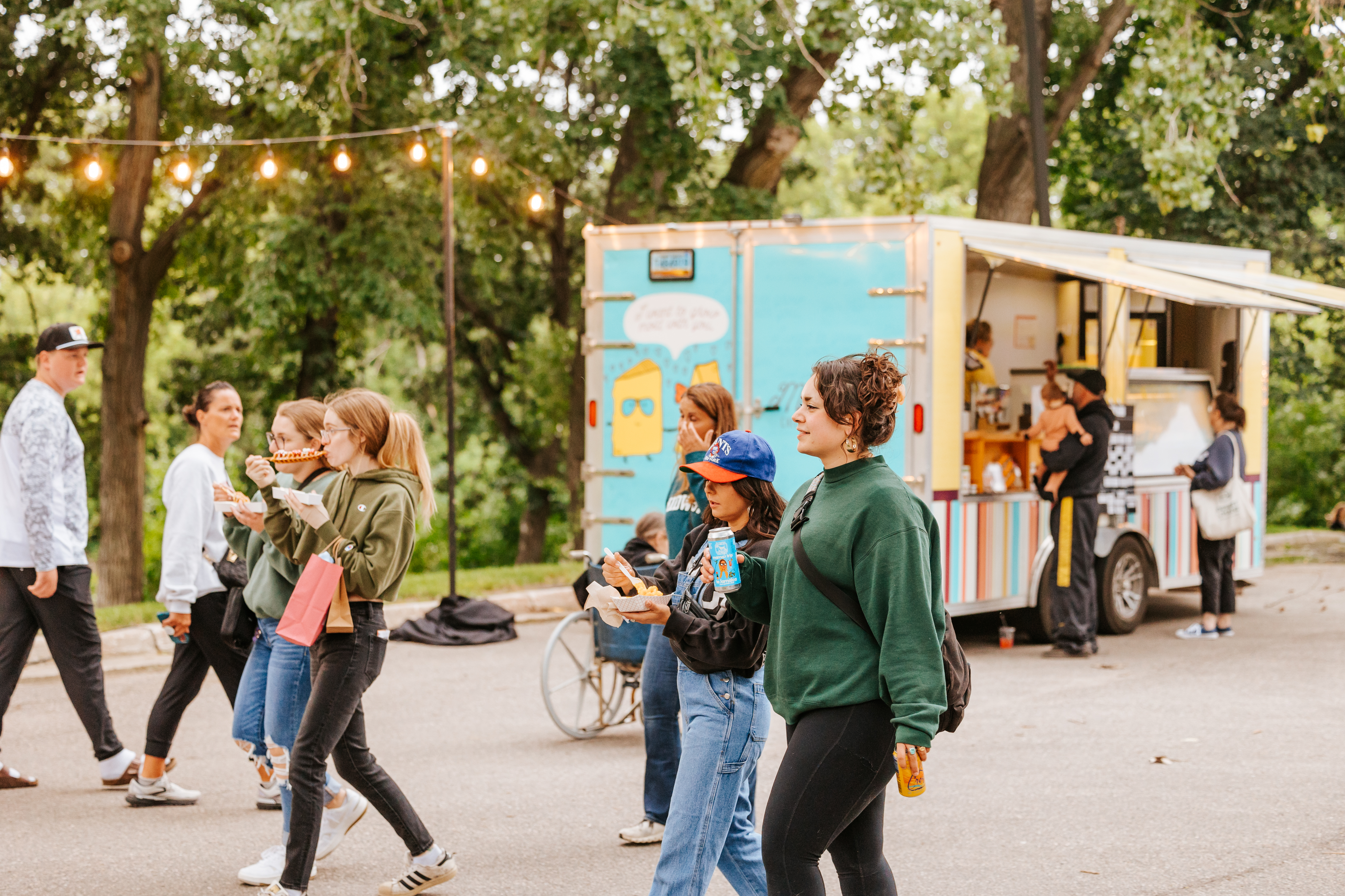 people walking at an event in Moorhead